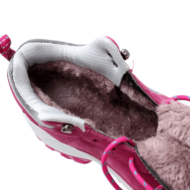 Close-up of pink insulated sports fur sneaker with plush lining and lace-up design
